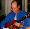 Michael Greenacre with John's guitar